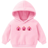 Drie maal de Lieveheersbeestje Roze Strijk Embleem Patch op een kleine roze hoodie