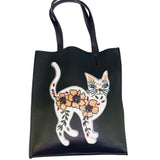 Poes Paillette XXL Strijk Applicatie Patch op een zwarte tas