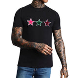 Ster Paillette Glitter Strijk Embleem Patch Groen samen met de rode en roze variant op een zwart t-shirt
