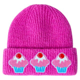 Die maal de Cupcake Met Kers Strijk Embleem Patch op een roze muts