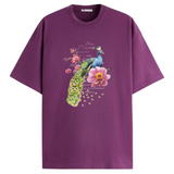 Pauw Peacock Full Color Strijk Applicatie op een paars t-shirt