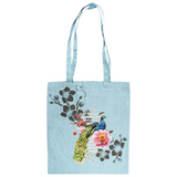 Pauw Peacock Full Color Strijk Applicatie op een blauw linnen tas met extra decoratie print
