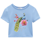 Pauw Peacock Full Color Strijk Applicatie op een blauw t-shirtje