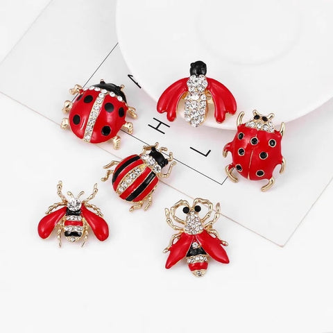 Broche lieveheersbeestje vergeet-me-nietje - Charlotte Vogel Juwelen Broche lieveheersbeestje vergeet-me-nietje - Charlotte Vogel Juwelen