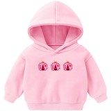 Drie maal de Lieveheersbeestje Roze Strijk Embleem Patch op een kleine roze hoodie