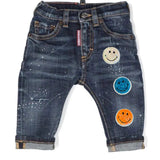 Smiley Strijkpatch Glitter Pailletten Strijkapplicatie samen met twee andere kleuren op een kleine spijkerborek