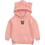 Teddy Beer Teddybeer Strijk Embleem Patch op een kleine roze hoodie