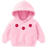 Drie maal de Madelief Bloemetje Strijk Embleem Patch Fuchsia Roze op een kleine roze hoodie