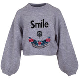 Happy Right Now Tekst Bloem Tak XXL Strijk Patch Embleem samen met twee strass strijk emblemen op een grijze sweater