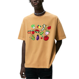 Groenten Fruit Strijk Embleem Patch Set op een oranje t-shirt