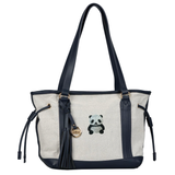 Panda Beer Strass Strijk Embleem Patch op een grijze canvas tas