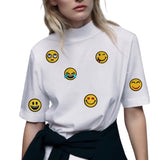 Emoji Smiley Strijk embleem Patch Tranen Lachen samen met andere emoji strijk patches uit dezelfde serie op een wit t-shirt