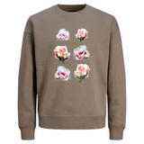 Roos Rozen Bloem Full Color Strijk Applicatie op een bruine sweater